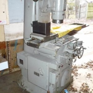 Abrasive surface grinder