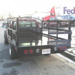 Two Truck beds designed, built and mounted for a Auto salvage yard